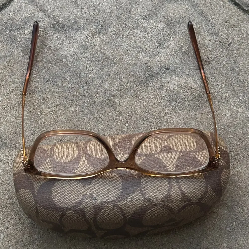 Coach HC6146U Eyeglass Frames and case Transparent brown butterfly silhouette